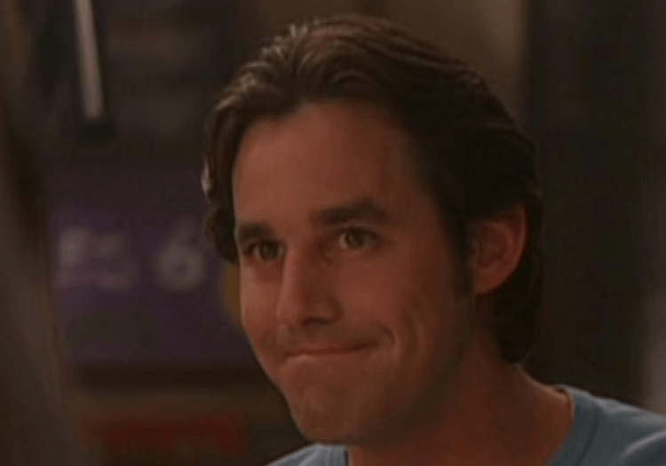 Nicholas Brendon in a still smiling slyly