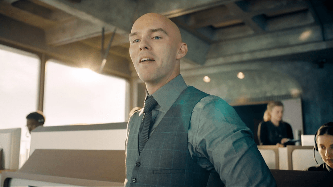 Lex Luthor looking down with a smug look in Superman