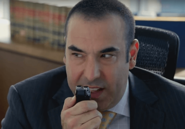 Louis Litt dictating in voice recorder 