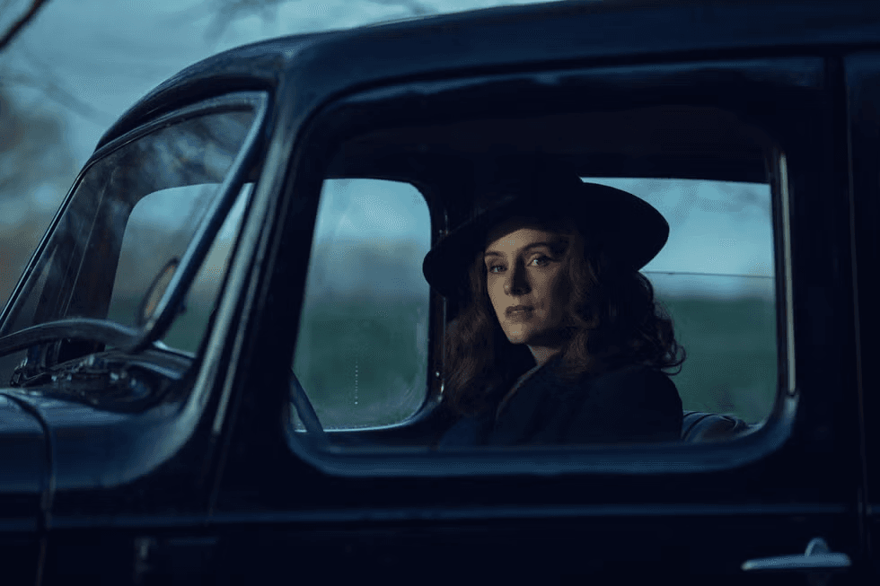 Ada Shelby sitting in her car in Peaky Blinders: The Immortal Man