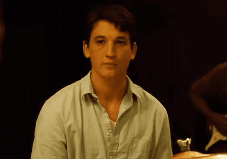 andrew talking to someone in whiplash