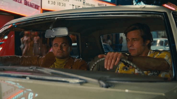 brad pitt and dicaprio in a car