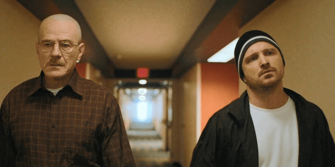 Jesse and Walter walking together in the lobby