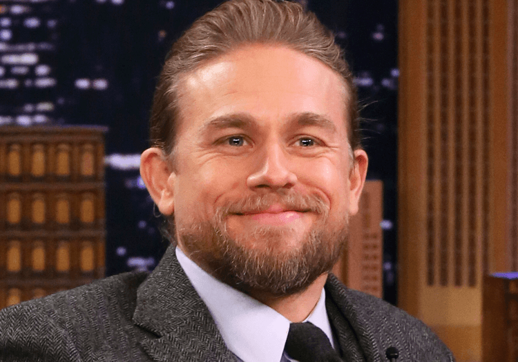 Charlie Hunnam smiling in a late night show