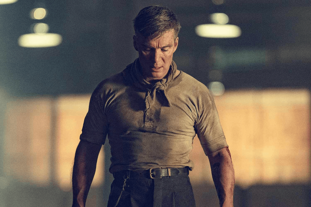 Cillian Murphy standing with bullet holes in Peaky Blinders: The Immortal Man