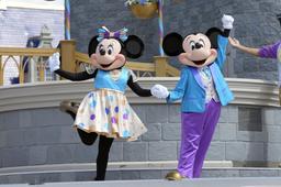 Mickey Mouse along with Minnie
