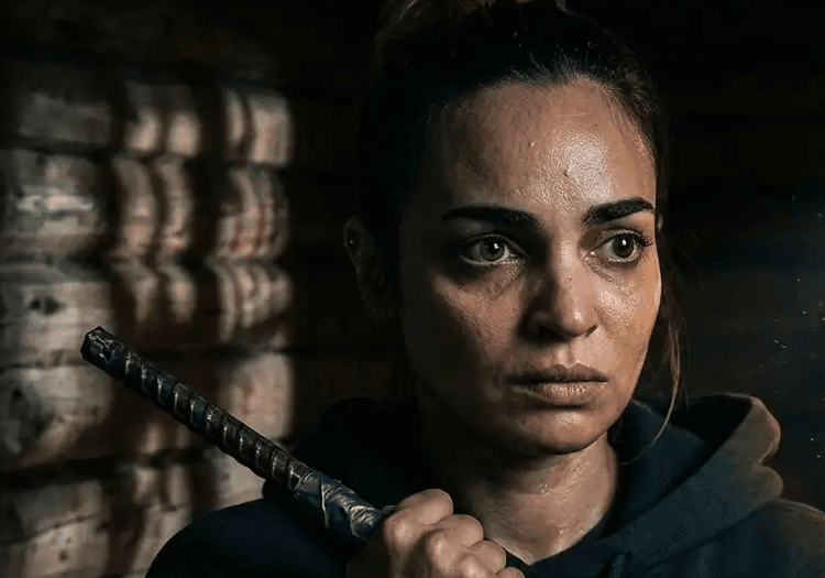 A woman holding a metal pipe in Evil Dead Burn