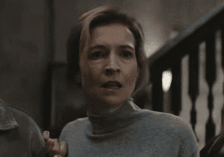 A woman looking afraid