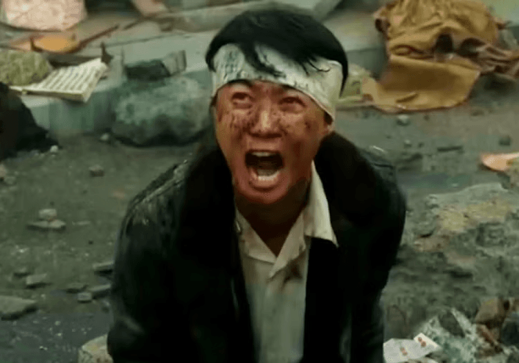 A man crying in Godzilla Minus One