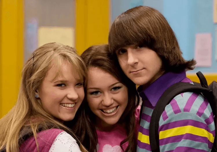 Miley Cyrus smiling and looking into the camera