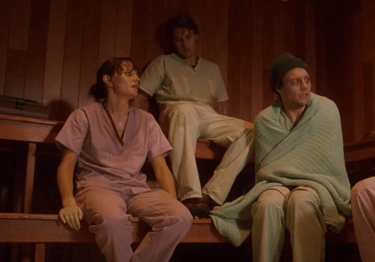 Doctor House team sitting with patient 