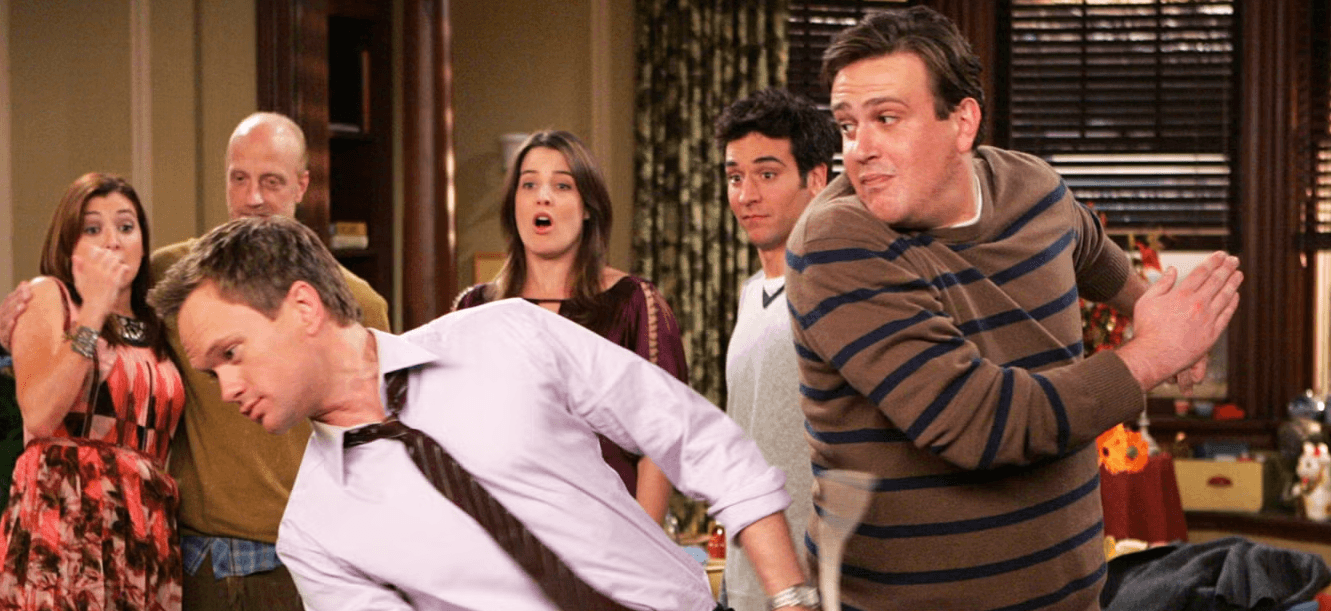 Marshall slapping Barney in How I Met Your Mother