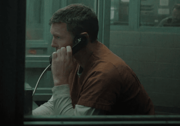 A man on the phone in I Will Find You