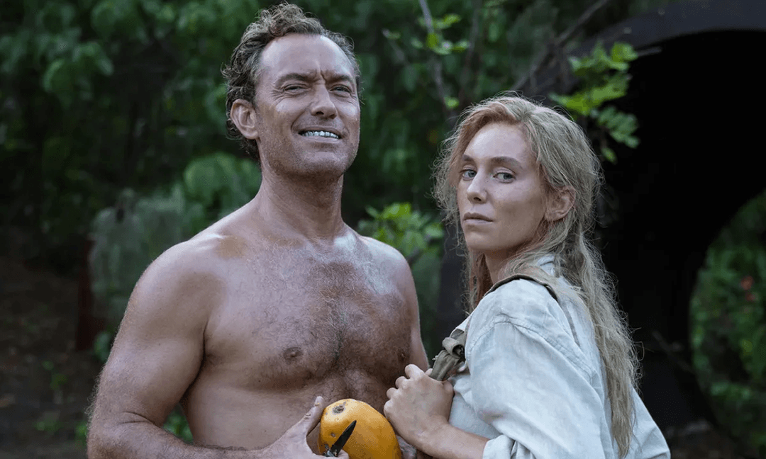 Two characters looking in a still from Eden