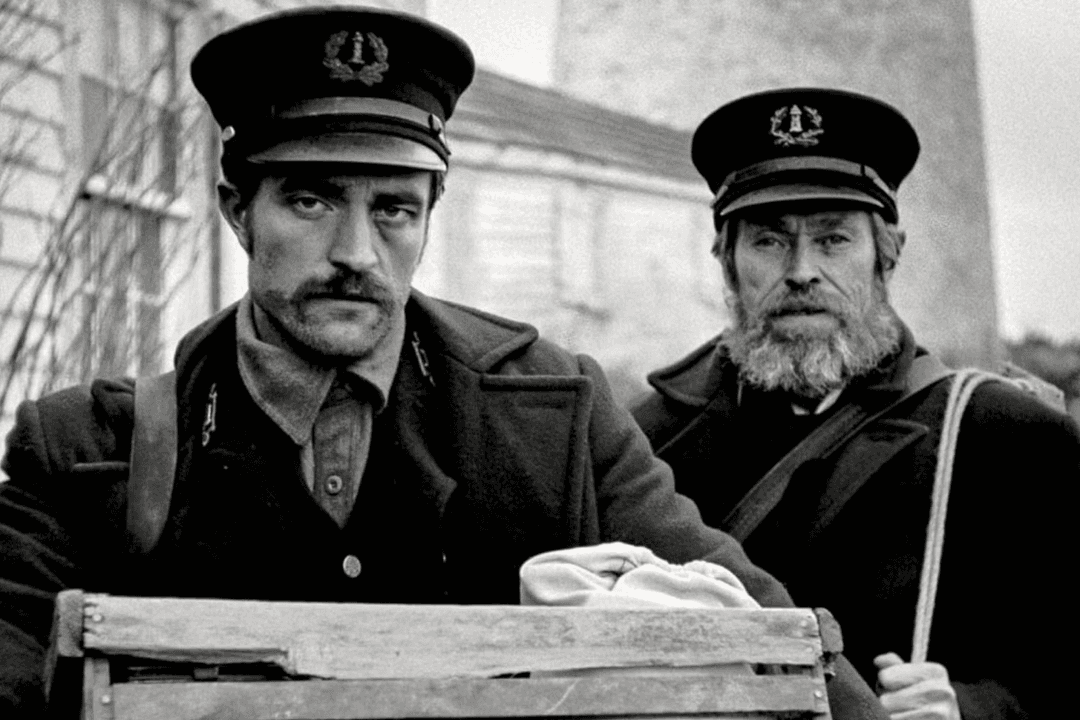 Two men standing and staring