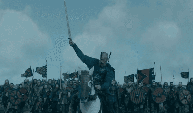 Bjorn Ironside with his sword raised high in Vikings