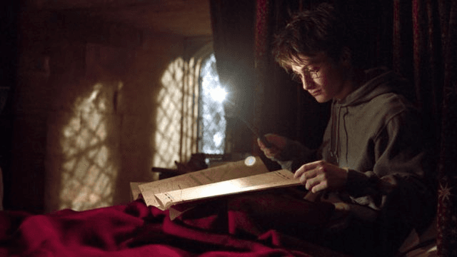 Harry looking at the The Marauder's Map