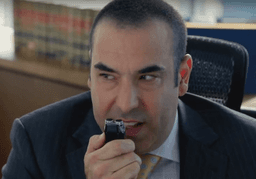Louis Litt dictating in voice recorder 