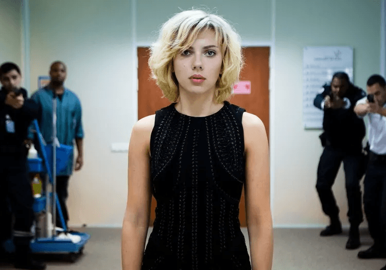 Scarlett Johnasson in and as Lucy