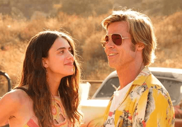 Margaret Qualley and Brad Pitt being flirty and cute
