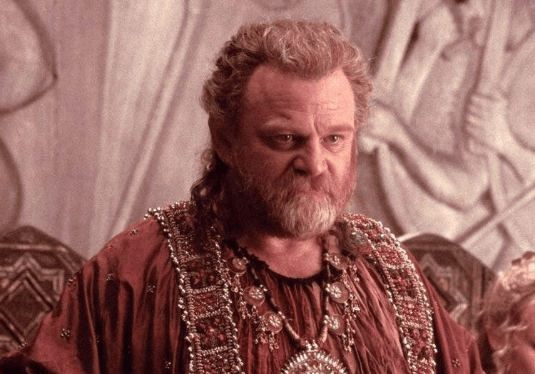 Menelaus talking to someone in a scene from Troy