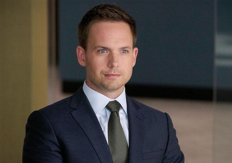 Mike Ross confidently sitting