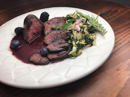 Grilled venison with berries