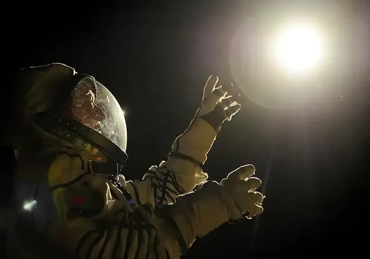 Ryan Gosling looking at space in Project Hail Mary