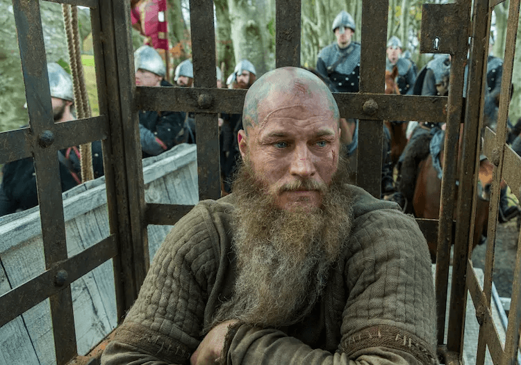 Ragnar Lothbrok in a cage in Vikings