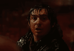 A man covered in blood