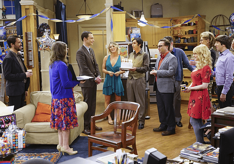 Sheldon Cooper standing with friends