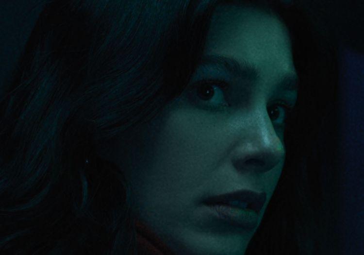 a girl looking a bit terrified but a lot confused