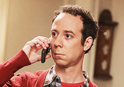 Stuart on a call in The Big Bang Theory