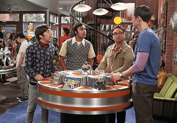 Stuart in the comic book shop with the cast