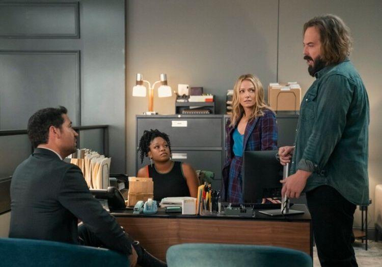 The Lincoln Lawyer cast talking in the office together