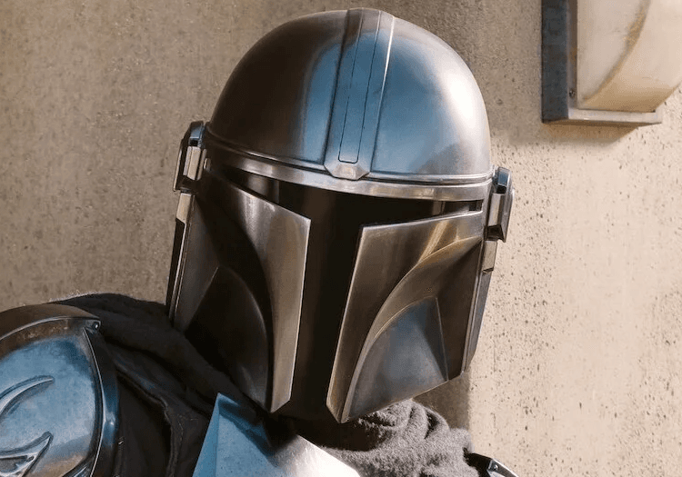 The Mandalorian sitting alongside Grogu