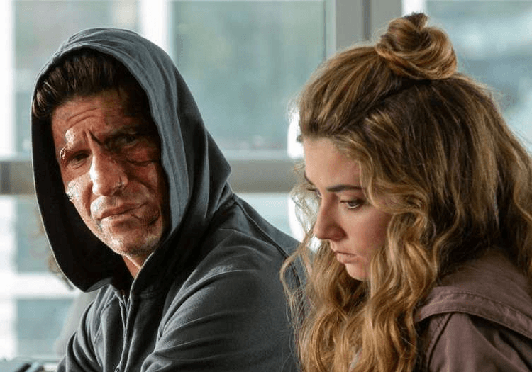 Frank Castle looking at a woman