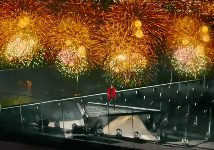 The Weeknd performing on a rooftop