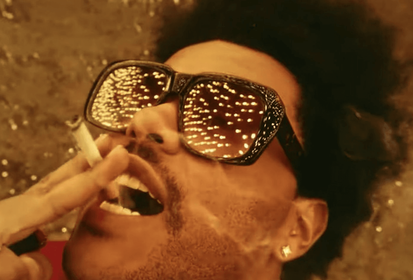 The Weeknd smoking a cigarette
