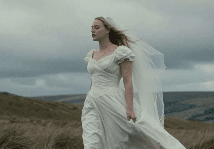 Margot Robbie walking in Wuthering Heights