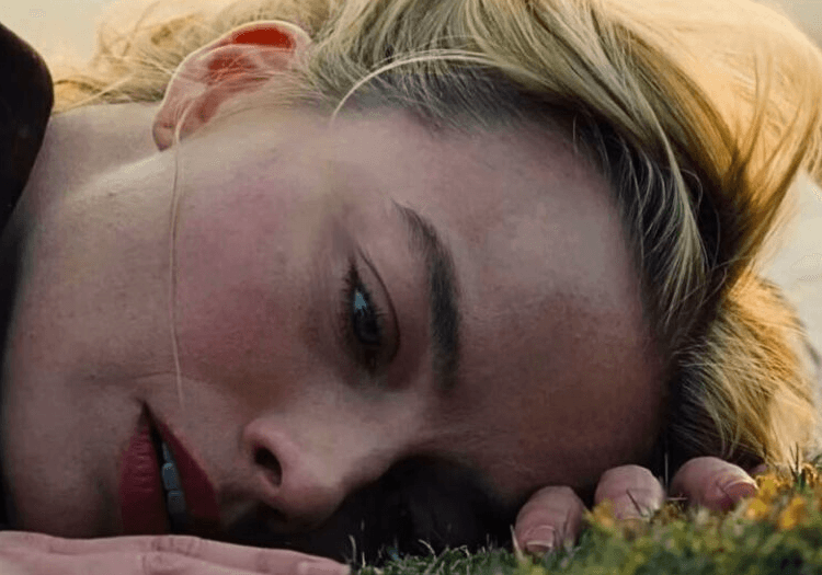 Margot Robbie on the ground