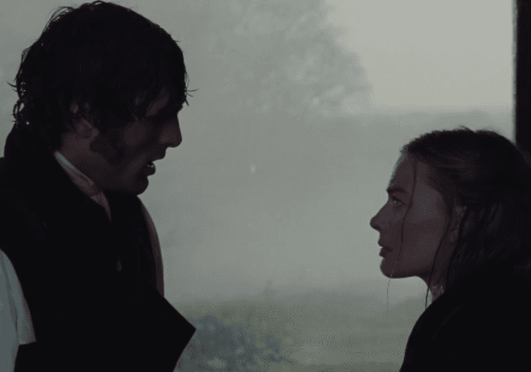 Jacob Elordi and Margot Robbie looking at each other