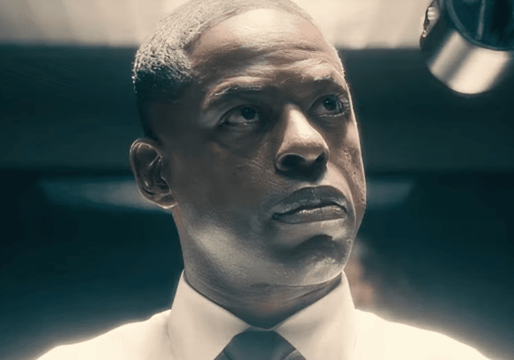 Xavier Collins looking to his right in Paradiseq