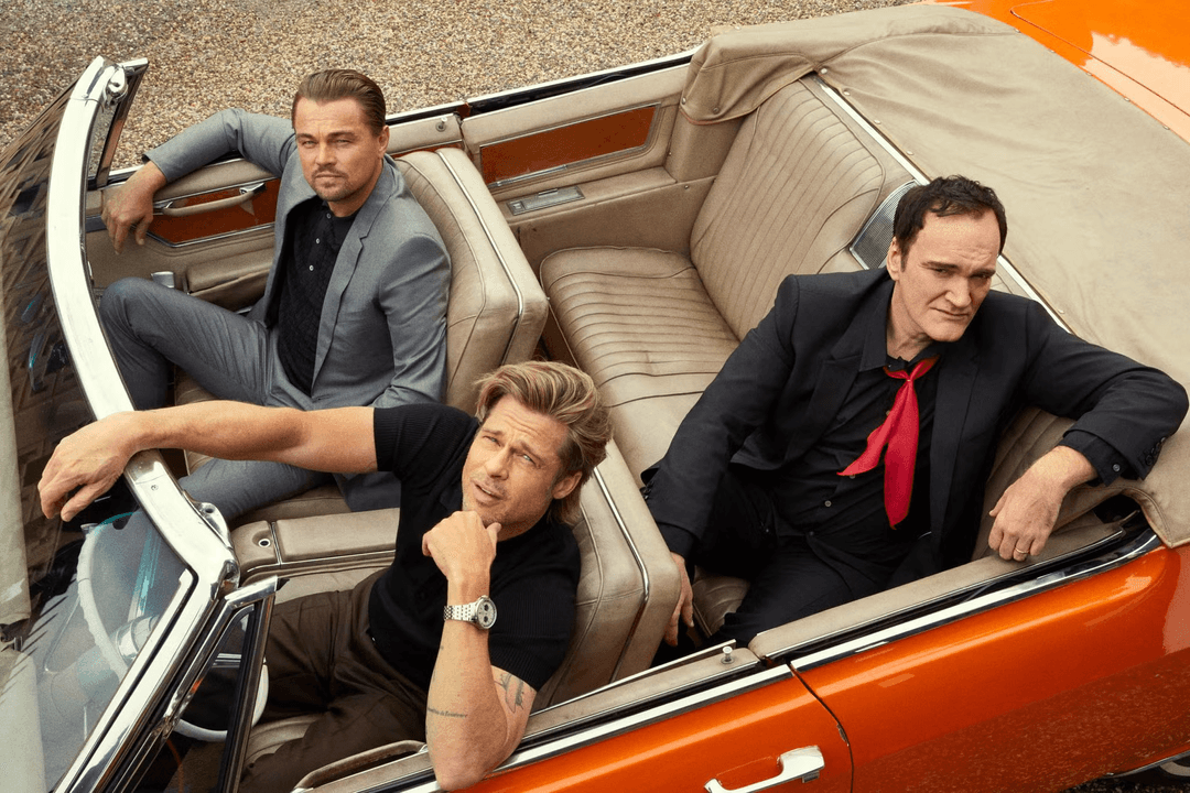Tarantino, Brad Pitt, and DiCaprio sitting in a car